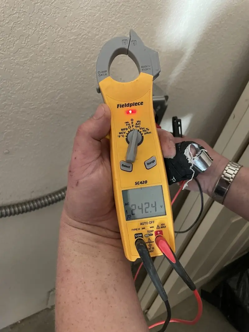 Voltage testing with clamp meter during Whole House Surge Protector in Lower Pottsgrove